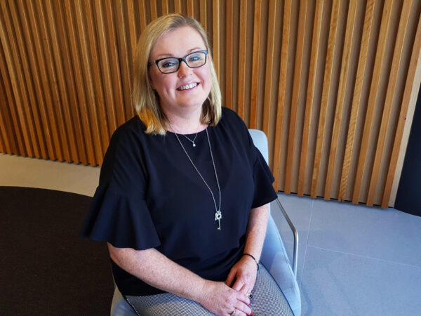 Sue-Maxwell-sitting-down-in-foyer