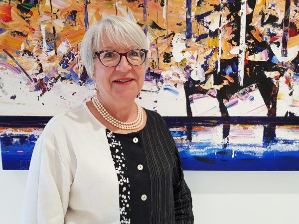 margaret-mcnamara-in-front-of-painting